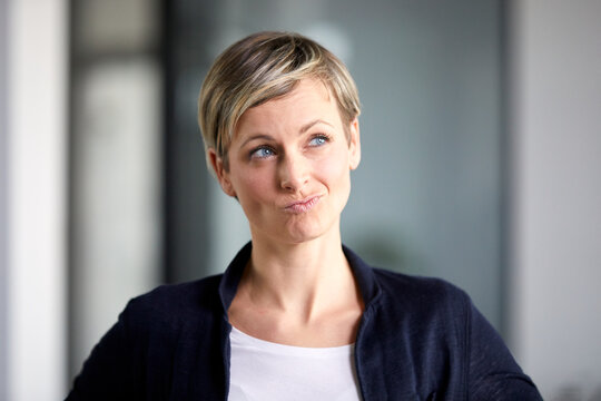 Portrait of a pensive businesswoman in office