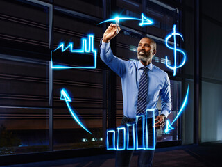 Businessman painting economic circulation with light