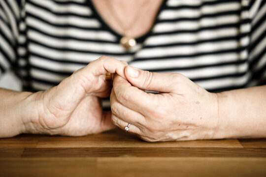 Hands of senior woman
