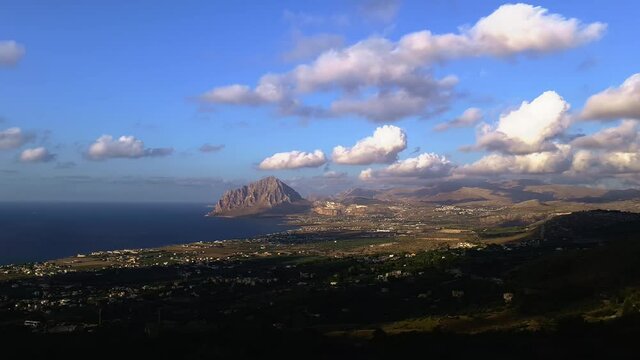 Running clouds over Monte Cofano Sicilian natural reserve close to San Vito Lo Capo in Italy. Time-lapse