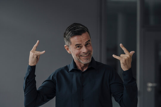 Portrait of happy mature businessman