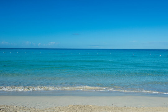 Jamaica, Montego bay, Turquoise water on a sandy beach