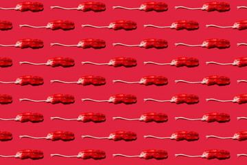 Pattern of used tampons against red background