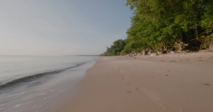 Ocean Waves By Kn&auml;b&auml;ckshusen Sand Beach in South Sweden &Ouml;sterlen, Low Wide Shot Tracking Forward With Gimbal