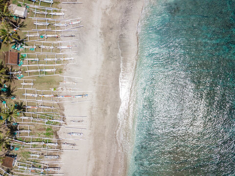 Indonesia, Bali, Karangasem, Aerial view of virgin beach, banca boats