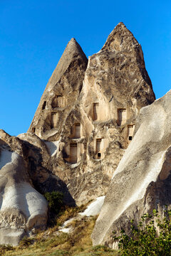 Scenic view of Dove complex monastery against clear blue sky in Goreme, Cappadocia, Turkey