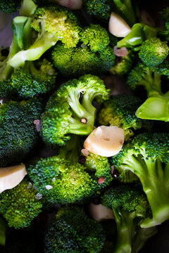 Chopped broccoli with garlic, salt and pepper