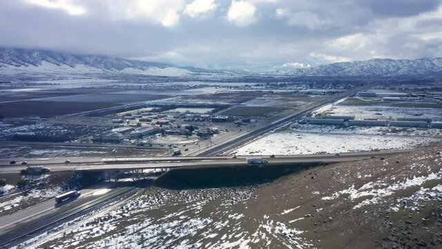 Flying over Highway 58 on a wintery, snowy day in Tehachapi, CA