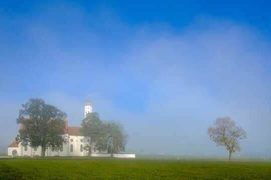 Germany, Bavaria, Schwabia, Schwangau, View to pilgrimage church St. Coloman and fog