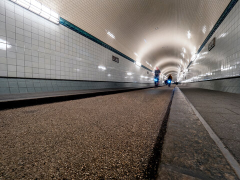 Old Elbe Tunnel with cyclists, Hamburg, Germany