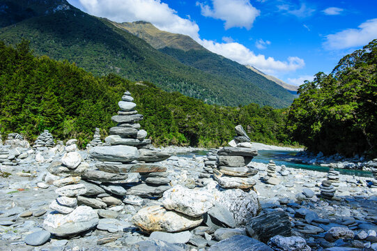 Man made stone pyramids at the Blue Pools, Haast Pass, South Island, New Zealand