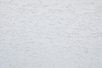 Asian modern plastered wall texture background. Luxury plastered wall with beautiful shadows caused...