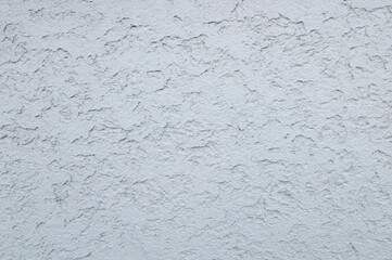 Asian modern plastered wall texture background. Luxury plastered wall with beautiful shadows caused...