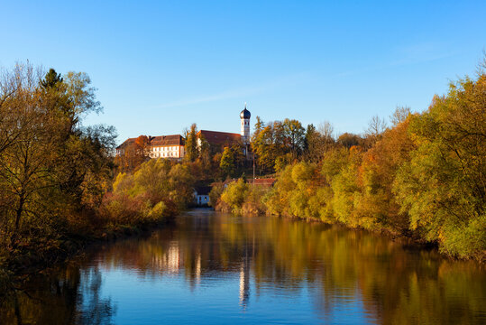 Germany, Bavaria, Upper Bavaria, Beuerberg Abbey and Loisach river in Autumn