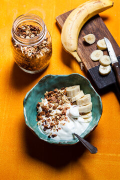 Chocolate coconut granola with bananas and yogurt