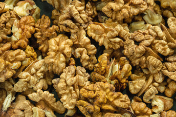 Top view of the halves of peeled walnuts. Close-up