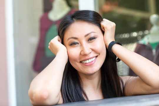 Young woman with smartwatch, paying cashless