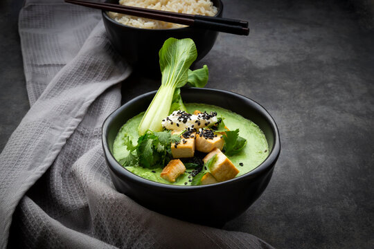 Green thai curry with spinach, pak choi, tofu, sour cream, black sesame and jasmine rice