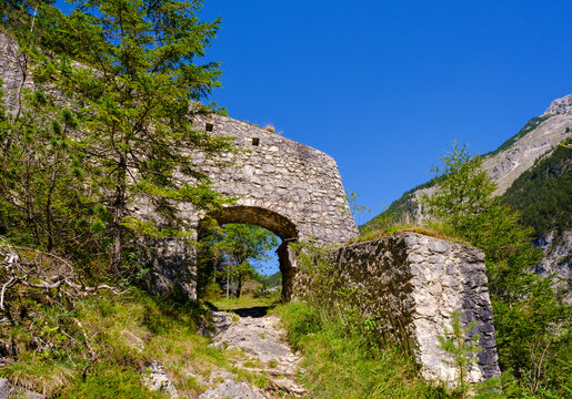 Gate in defensive wall of Porta Claudia against clear blue sky at Scharnitz, Tyrol, Austria