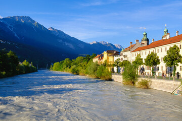 Inn with cathedral by river at Innsbruck, Austria