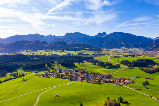 Germany, Bavaria, Zell bei Eisenberg, Aerial view of village in Allgau Alps