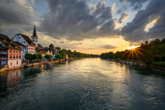Switzerland, Canton of Thurgau, Diessenhofen, High Rhine and adjacent village at moody sunset