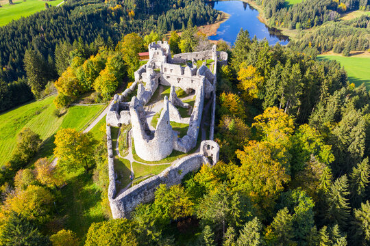 Germany, Bavaria, Eisenberg, Aerial view of ruins of Hohenfreyberg Castle standing on top of forested hill