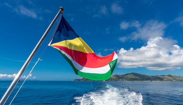 Seychelles, Praslin Island, Flag of Seychelles and sea