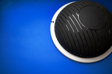 Bosu modern gym ball on blue mat top view