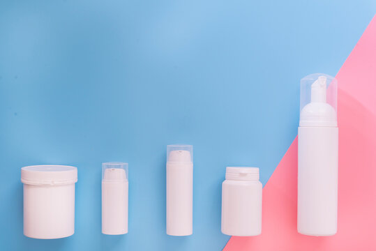 Row of containers for cosmetics