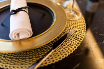 Close-up of lace setting on table in a fancy restaurant