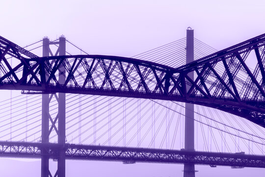 United Kingdom, Scotland, Fife, Edinburgh, Firth of Forth estuary, Forth Bridge, Forth Road Bridge and Queensferry Crossing Bridge in the background