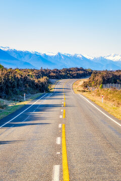 Diminishing view of State Highway 94 against clear sky, Te Anau, South Island, New Zealand