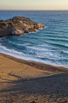 Beach of  Agios Pavlos with sunshades, Crete, Greece