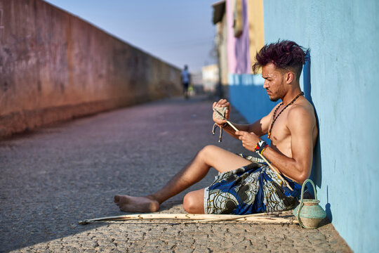 Tribal man with his traditional arch and arrows, Lubango, Angola