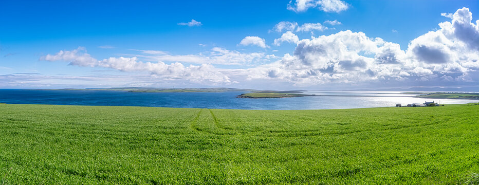 Scotland, Orkney Islands, View over Kirk Sound and towards one of the Churchill Barriers on and Scapa Flow in distance