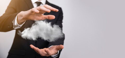 Hand holding icon cloud computing network and icon connection data information in hand. Cloud computing and technology concept.