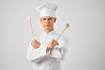 Cheerful male chef kitchen cooking professional work