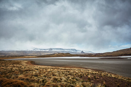 Chile, Valle Chacabuco, Parque Nacional Patagonia, gravel road in mountainscape at Paso Hondo