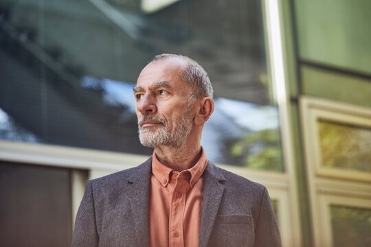 Senior businessman in the city, portrait