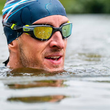 Young triathlete in a lake