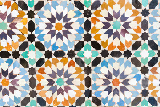 Morocco, Marrakesh, Ben Youssef Madrasa, detail of colorful tiles