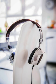 Headphones hanging on back rest