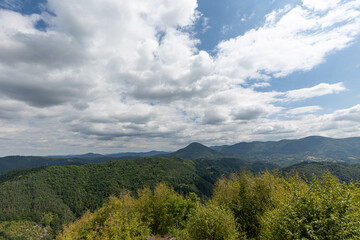Mountain and forest with dramatic cloudy sky