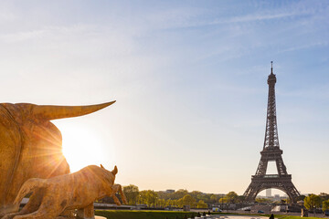 France, Paris, Eiffel Tower with statues at Place du Trocadero at sunrise