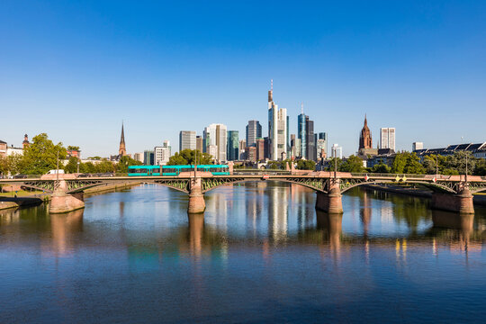 Ignatz Bubis Bridge over River Main against clear blue sky at Frankfurt, Germany