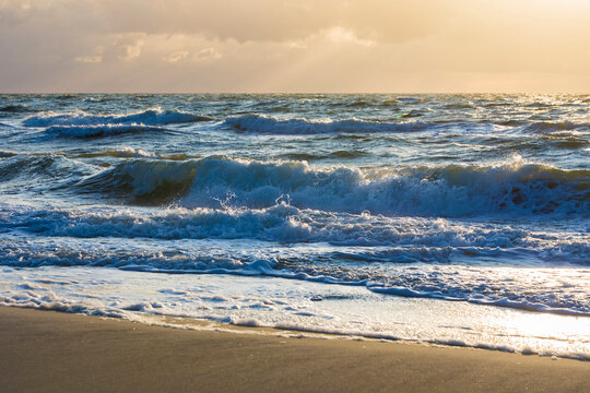 Germany,&Ocirc;&oslash;&Omega;Mecklenburg-Western Pomerania, Prerow, Waves brushing sandy coastal beach of Baltic Sea at dusk