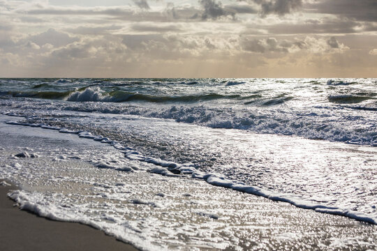 Germany,&Ocirc;&oslash;&Omega;Mecklenburg-Western Pomerania, Prerow, Waves brushing sandy coastal beach of Baltic Sea at dusk
