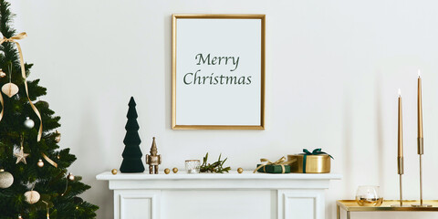 Christmas composition with gold mock up poster frame, white chimney and decoration. Christmas trees...