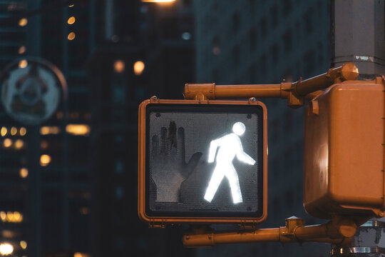 Pedestrian light at night, Manhattan, New York City, USA